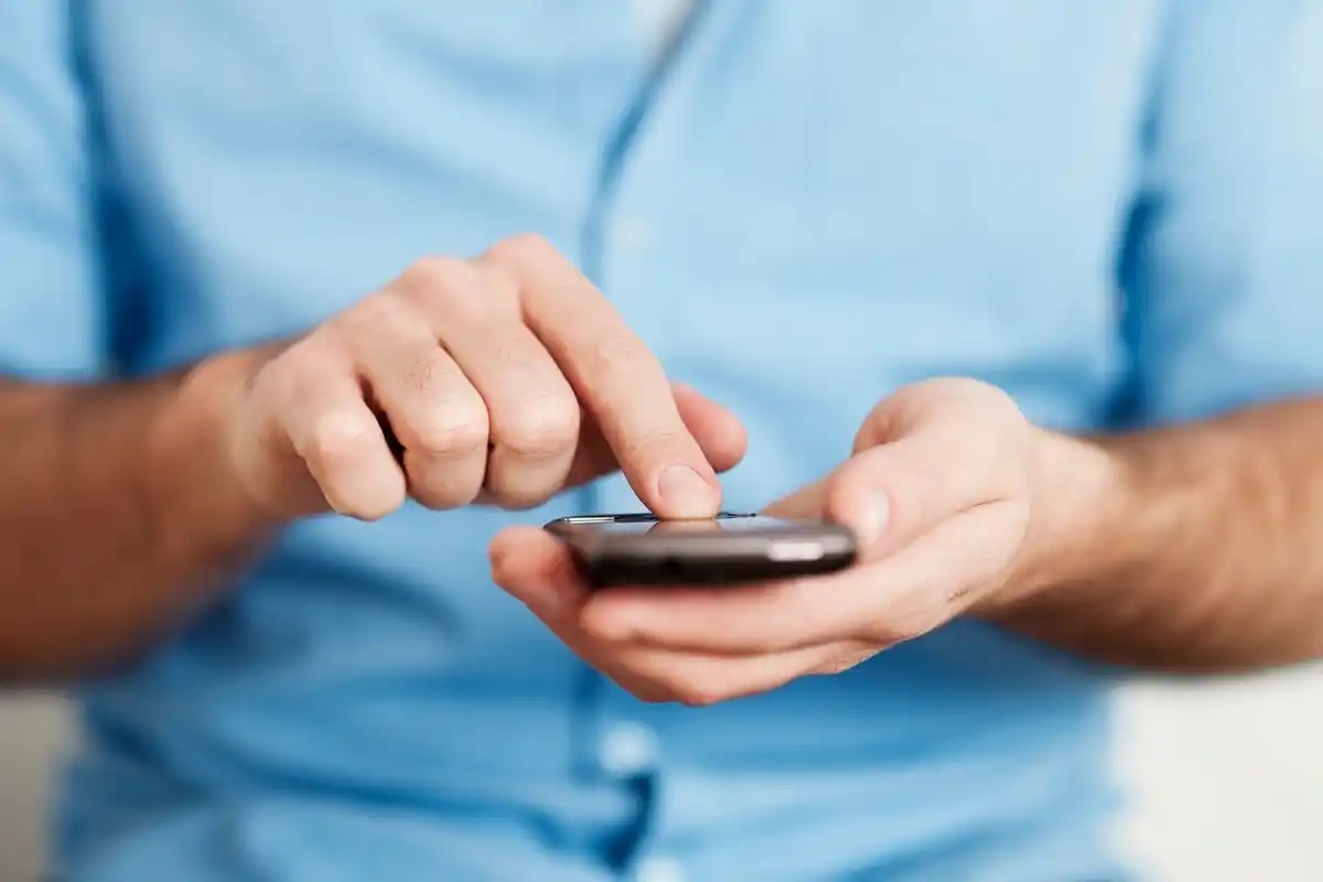 person using new gadget smartphone settings