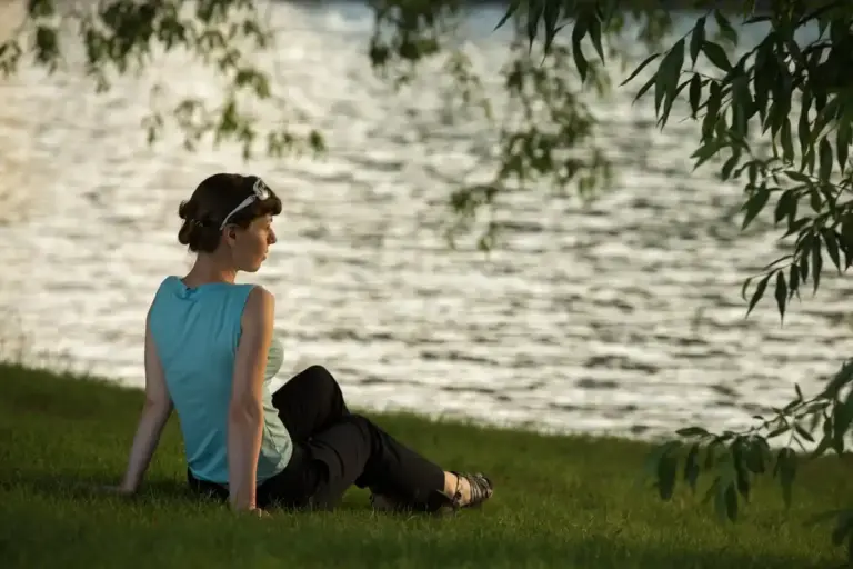relaxed person breathing exercise nature walk
