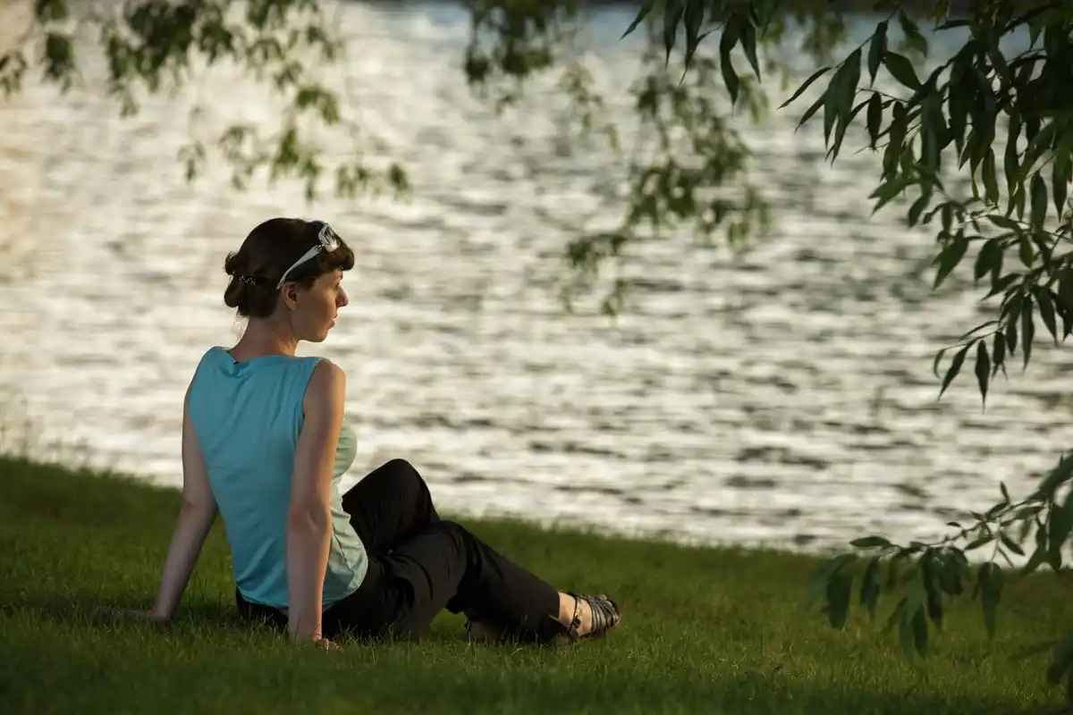 relaxed person breathing exercise nature walk