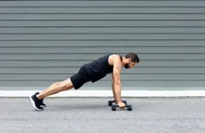 man doing plank exercise Netherlands gym