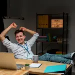 office worker moving/stretching at desk