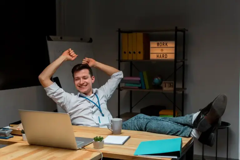 office worker moving/stretching at desk