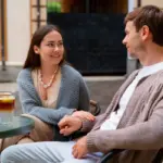 couple having serious conversation in Dutch cafe