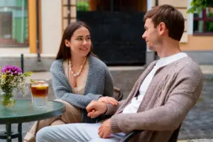 couple having serious conversation in Dutch cafe