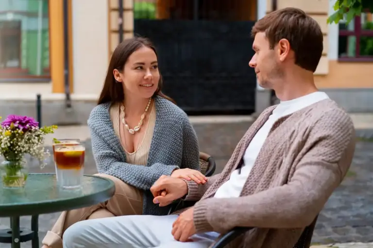 couple having serious conversation in Dutch cafe