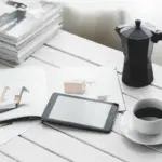 productive daily planning tools working laptop coffee