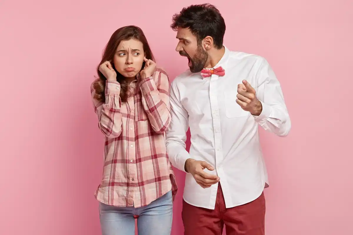 couple having small argument and smiling