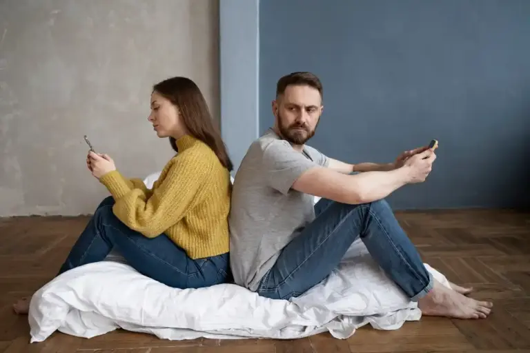 couple arguing and reconciling at home